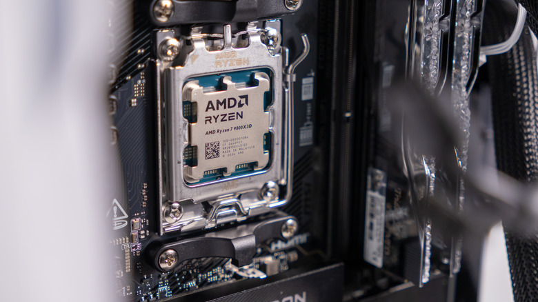 An AMD Ryzen 7 9800X3D processor socketed into a motherboard