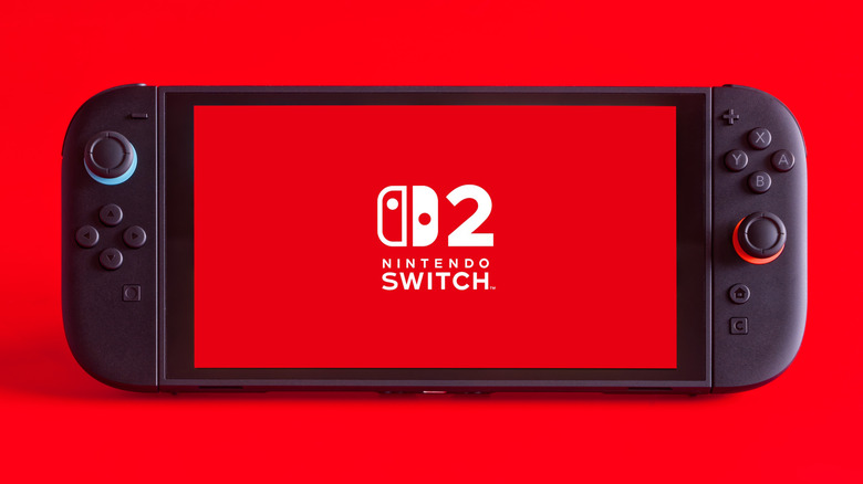 Nintendo Switch 2 console with the logo displayed on a red screen.