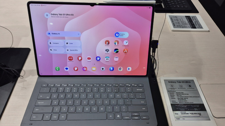 The Samsung Galaxy Tab S11 Ultra with its keyboard cover attached in a store