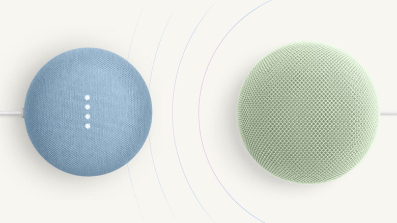 An older Google Nest speaker (left) is next to a Google Home Speaker (right).