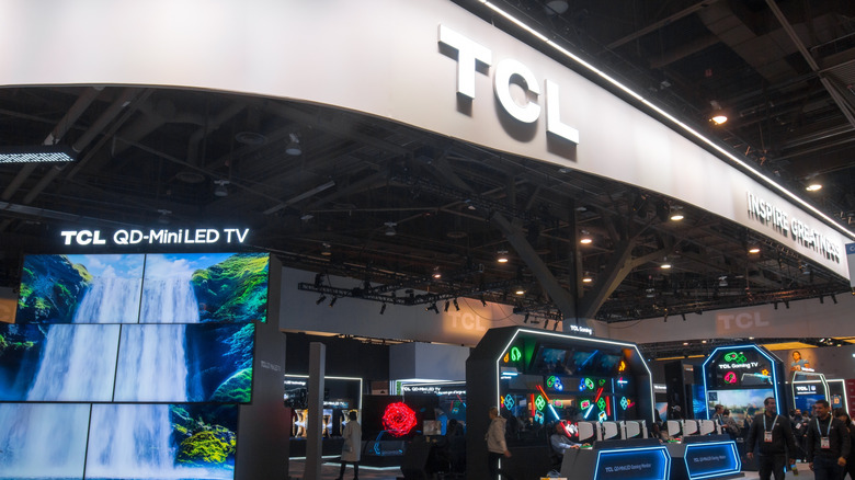 TCL TVs displayed at a tech expo.