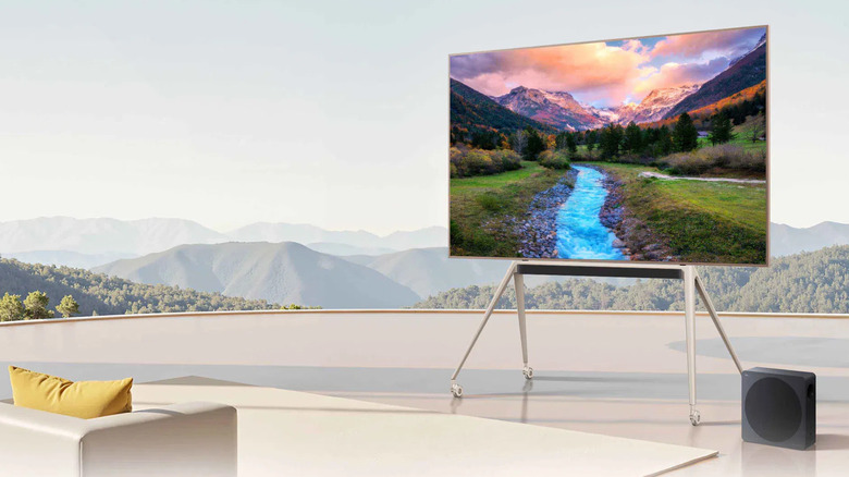 The TCL A65K Design Series Soundbar set up to a TV.