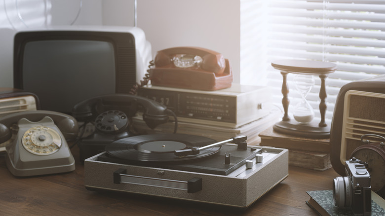 Various pieces of retro technology on table