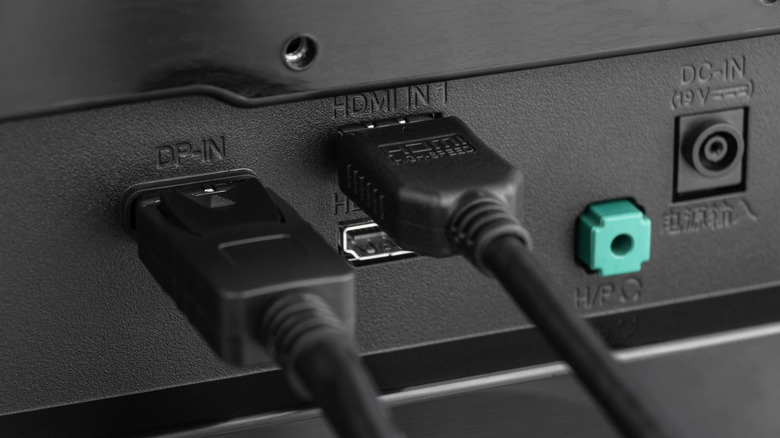 HDMI and USB cables plugged into ports