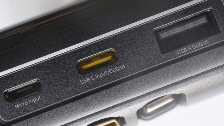 Close-Up of a power bank showing USB Type‑C, USB Type‑A, and Micro‑USB ports