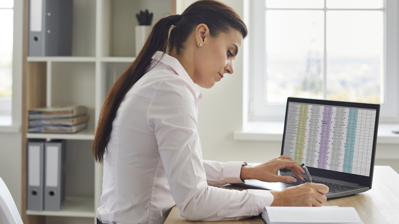 A woman tracking office productivity