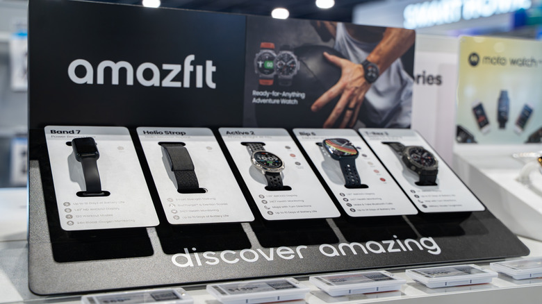 Amazfit smartwatches retail display visible on a shelf.