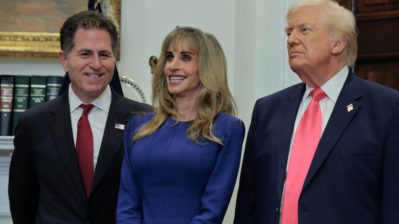 Michael & Susan Dell photographed next to Donald Trump on the right