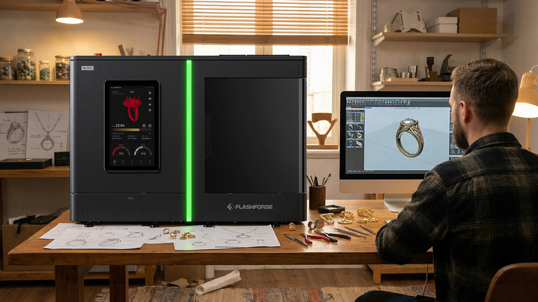 Person printing an object with a FlashForge 3D printer.