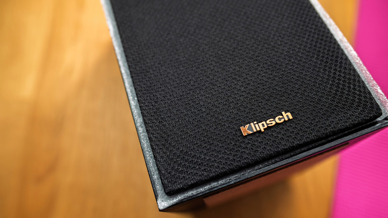 A close-up image of the grille of a Klipsch speaker.