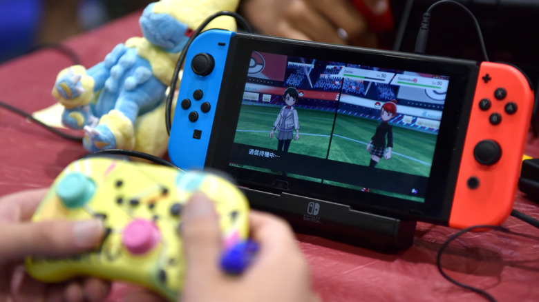 playing a video game on a Nintendo Switch