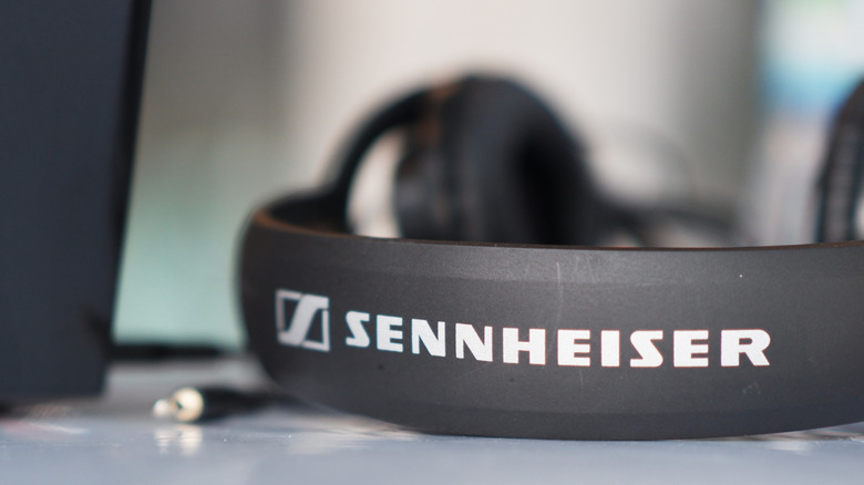 Headphones headband showing a Sennheiser logo.