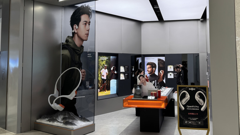 Shokz bone conduction headphones on display at a Shokz retail outlet.