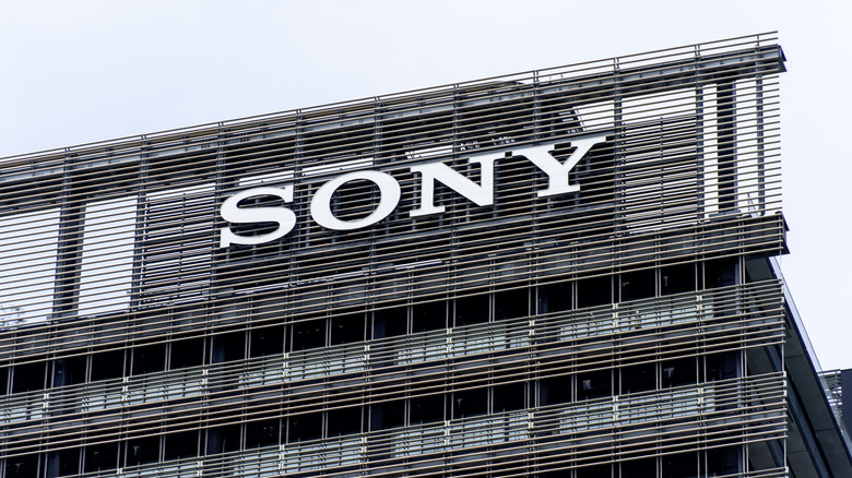 a camera shot of a Sony logo on top of a building in Japan