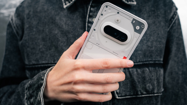 A Nothing phone being held