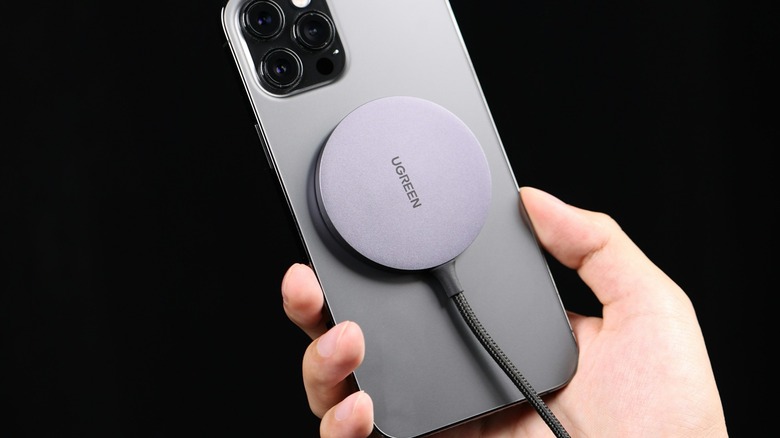 UGREEN charger connected to the back of a phone.