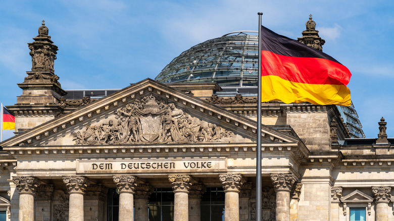 The flag of Germany outside an important building