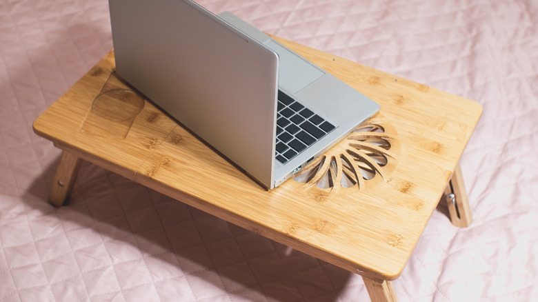 a laptop on a stand