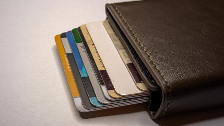 An RFID blocking wallet containing several payment cards
