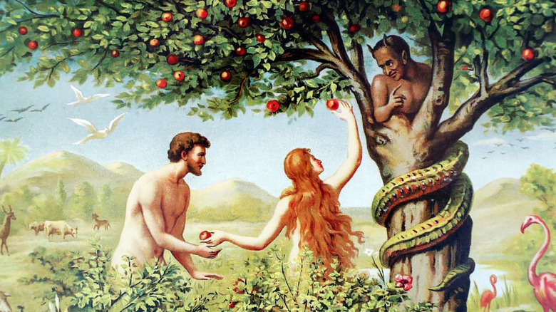 Adam and Eve taking an apple from the tree