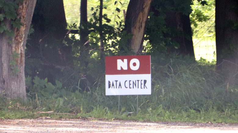 A "No Data Center" sign in the ground by the road.