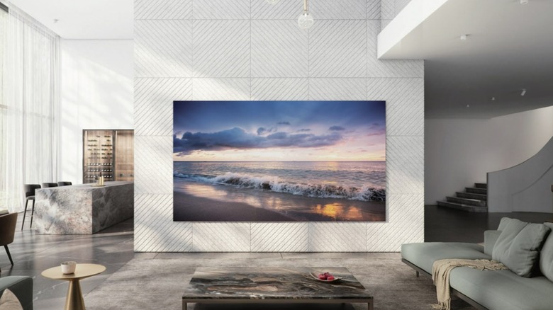 Samsung microLED tv set taking up an entire wall in a fancy expensive house