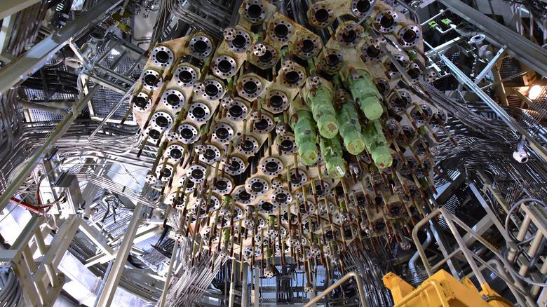 A close up view of nuclear fuel rods in a reactor to generate power through fission.