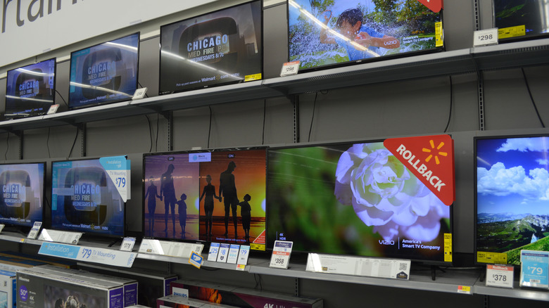 TVs from different manufacturers dislayed for sale at a store