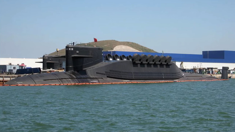 The hull of China's Type 094 submarine sits docked at port.