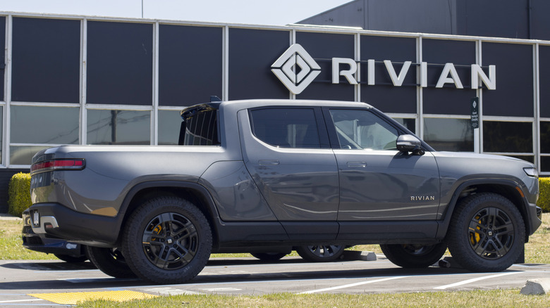 Rivian R1T parked in front of headquarters.