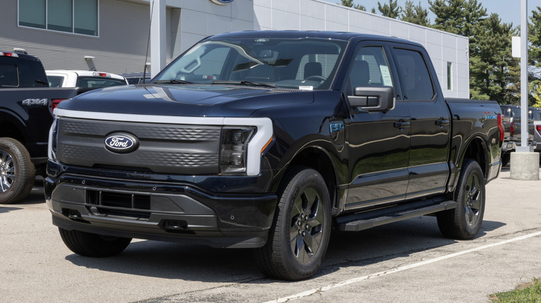 Ford F-150 Lightning electric truck parked.