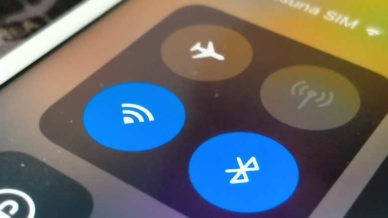 Wi-Fi and Bluetooth symbols on a phone