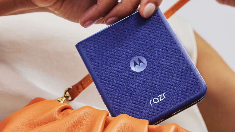 A person holding the 2026 Motorola Razr.