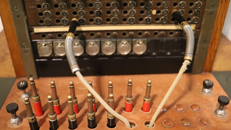 A manual telephone exchange switchboard.