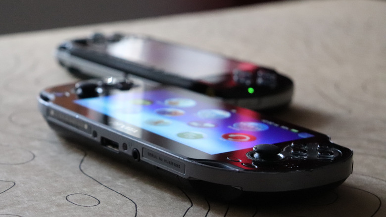 A PlayStation Vita and a PlayStation Portable