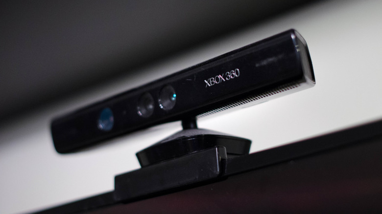 xbox kinect atop a tv