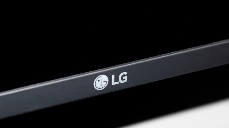 a close up of the LG logo on a smart TV while screen is off