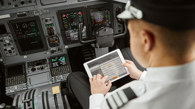 Airline pilot planning fuel weight and balance