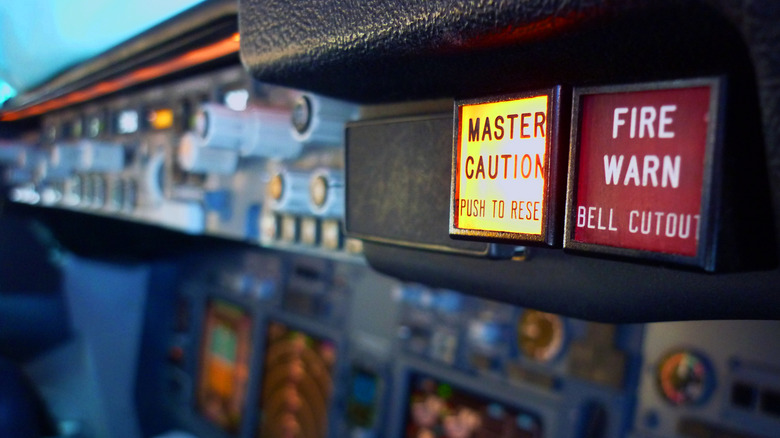 Airliner master caution lights illuminated