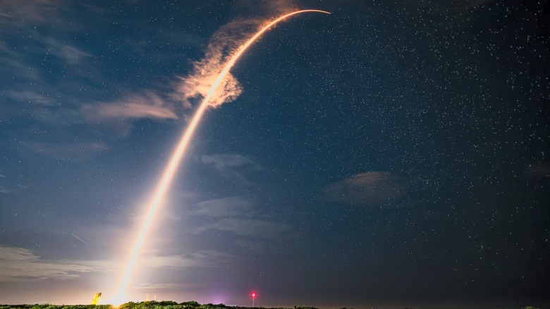 X-37B Mission 8 rocket launching from Kennedy Space Center at night