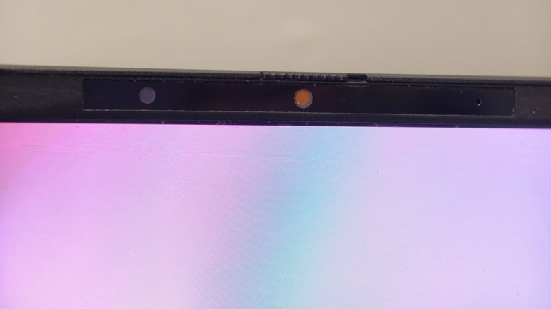 Just what are those holes next to your laptop's camera for?