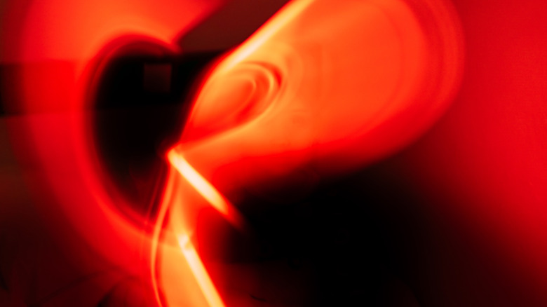 A pattern of swirling red light