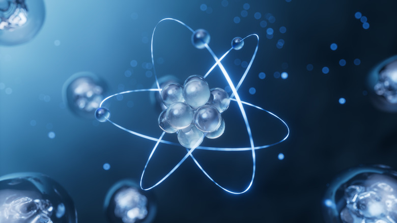 3D render of an atom in front of a blue background