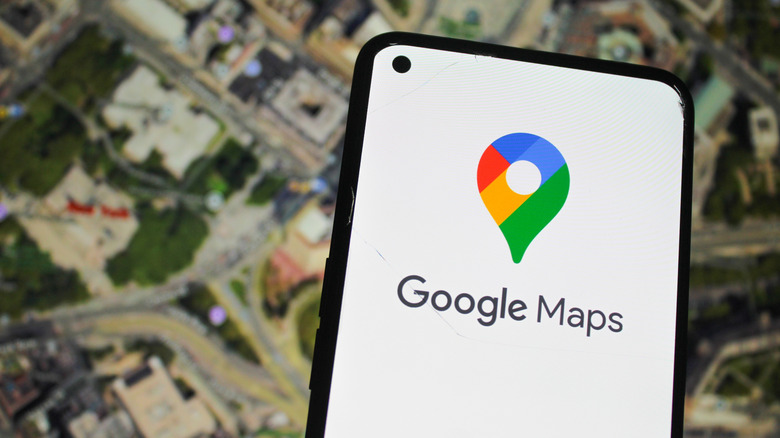 Google Maps logo on smartphone