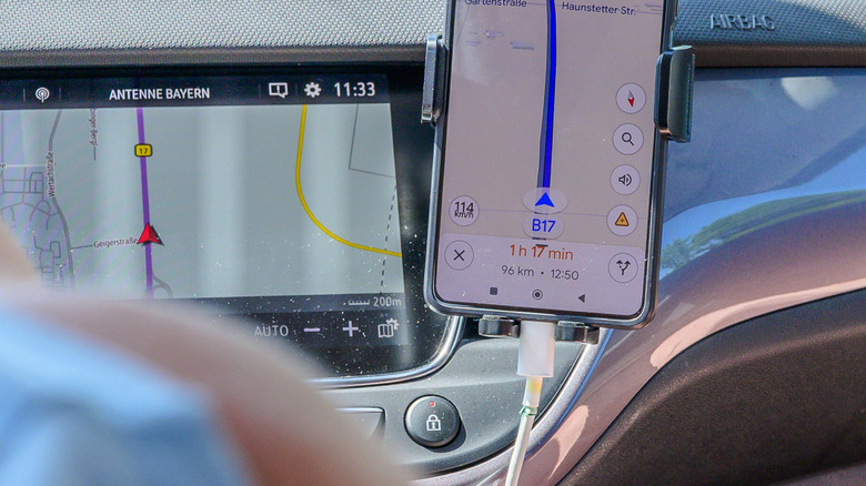 Close up of Google Maps ETA in the color red for bad traffic ahead.