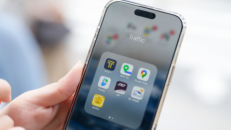 Navigation apps on an iPhone in Korea, including Naver Maps and Google Maps.