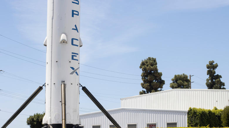 SpaceX logo on a Falcon 9 rocket booster.