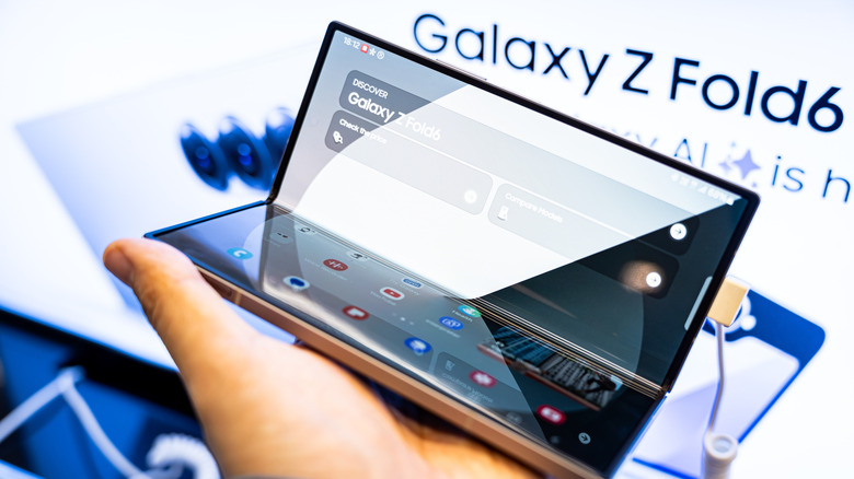 A hand holding the Samsung Galaxy Z Fold 6