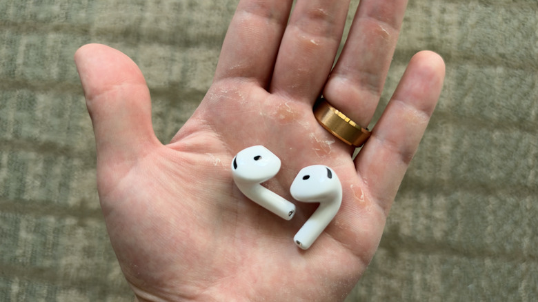 AirPods 5 sat in the palm of my hand