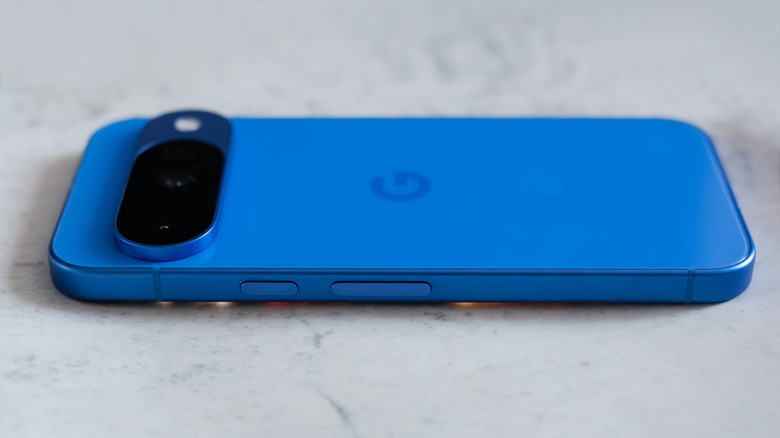 Google Pixel 10 lying on its side on a surface